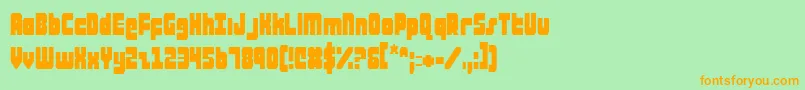 AlphaTaurusCondensed-Schriftart – Orangefarbene Schriften auf grünem Hintergrund