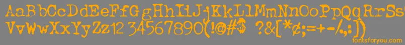 BtdBeezwax-Schriftart – Orangefarbene Schriften auf grauem Hintergrund