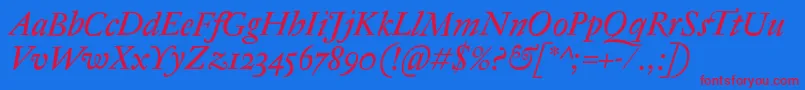 AntiqueRegentItalic Font – Red Fonts on Blue Background