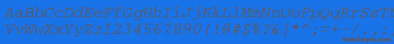 フォントCrtmO – 茶色の文字が青い背景にあります。