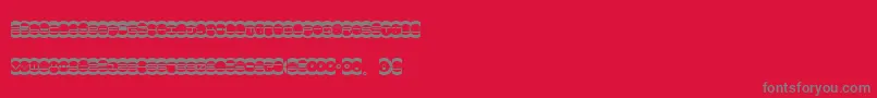 Miste-fontti – harmaat kirjasimet punaisella taustalla