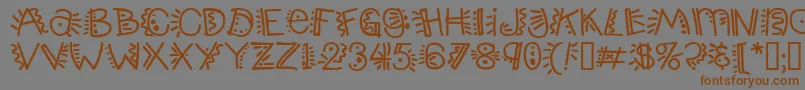 Шрифт Popticsthree – коричневые шрифты на сером фоне