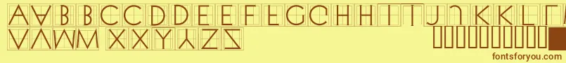 フォントXperimentypothreesquare – 茶色の文字が黄色の背景にあります。