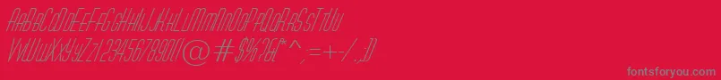 Czcionka AHuxleycapsItalic – szare czcionki na czerwonym tle