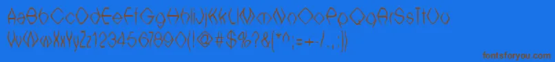 フォントWitchesbrew – 茶色の文字が青い背景にあります。