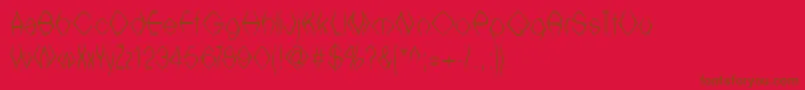 フォントWitchesbrew – 赤い背景に茶色の文字