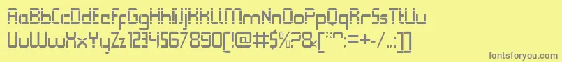 QueuebrickOpenregular-fontti – harmaat kirjasimet keltaisella taustalla