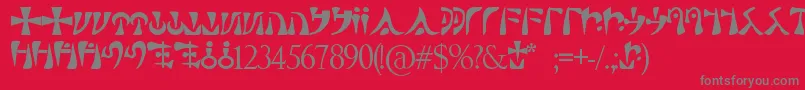 Sacre-Schriftart – Graue Schriften auf rotem Hintergrund
