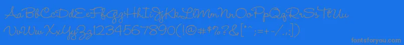 WendylpstdMedium-fontti – harmaat kirjasimet sinisellä taustalla