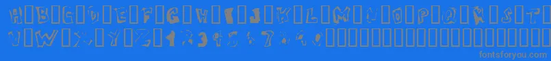 VictimOddtype-Schriftart – Graue Schriften auf blauem Hintergrund
