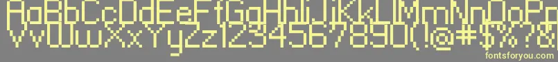 Standard0955-fontti – keltaiset fontit harmaalla taustalla