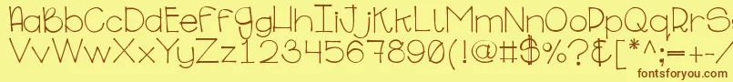 Ginabinaregular Font – Brown Fonts on Yellow Background