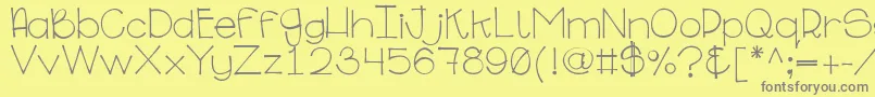 Ginabinaregular Font – Gray Fonts on Yellow Background