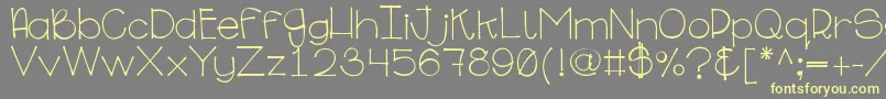 Ginabinaregular Font – Yellow Fonts on Gray Background