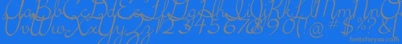 Fonte 5thgradecursive2Italic – fontes cinzas em um fundo azul