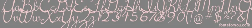 フォント5thgradecursive2Italic – 灰色の背景にピンクのフォント