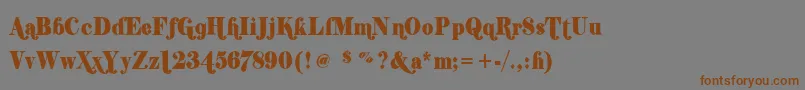 フォントShiftyChica2 – 茶色の文字が灰色の背景にあります。