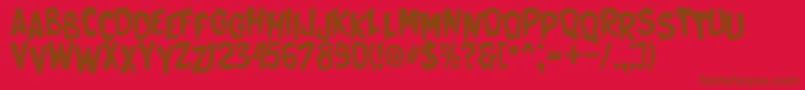 CatWomen Font – Brown Fonts on Red Background