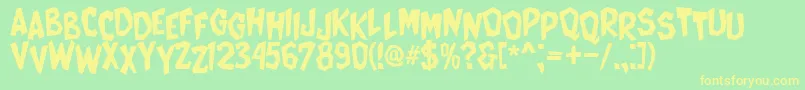 CatWomen Font – Yellow Fonts on Green Background