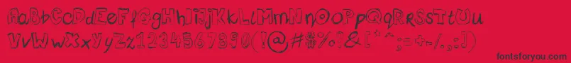 Femkeklaver-Schriftart – Schwarze Schriften auf rotem Hintergrund