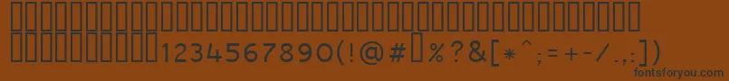 Raavi Font – Black Fonts on Brown Background