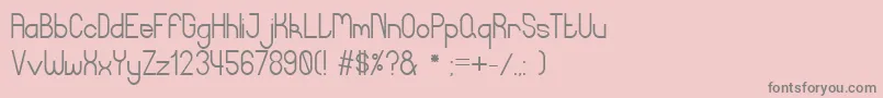 フォントCurvada1 – ピンクの背景に灰色の文字