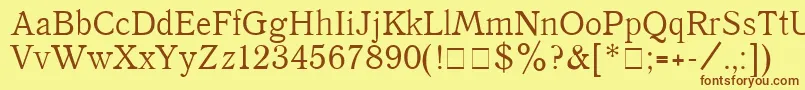 フォントQuantpla – 茶色の文字が黄色の背景にあります。