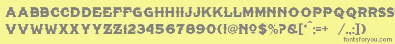 フォントTonicLhfLiver – 黄色の背景に灰色の文字