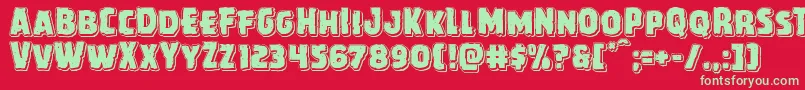 Howlinmadpunch-Schriftart – Grüne Schriften auf rotem Hintergrund