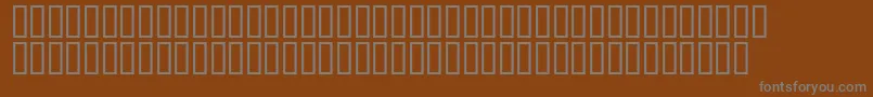 フォントMr.Fixby – 茶色の背景に灰色の文字