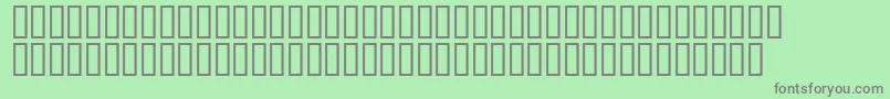 Mr.Fixby-fontti – harmaat kirjasimet vihreällä taustalla