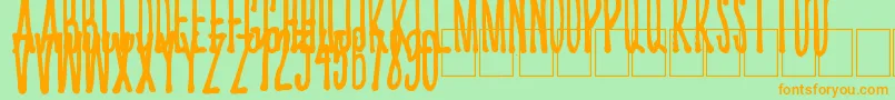 Kriips-Schriftart – Orangefarbene Schriften auf grünem Hintergrund