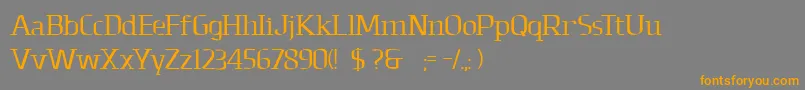 フォントDolomites – オレンジの文字は灰色の背景にあります。