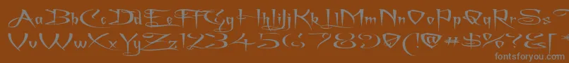 fuente ACharmingFontSuperexpanded – Fuentes Grises Sobre Fondo Marrón