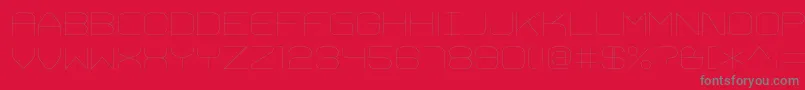 フォントTrivialThin – 赤い背景に灰色の文字