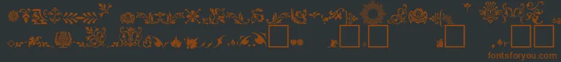 FleuronsA Font – Brown Fonts on Black Background