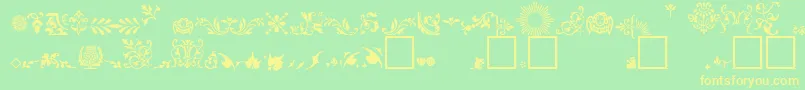 Czcionka FleuronsA – żółte czcionki na zielonym tle