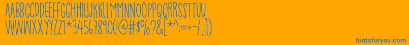 Fonte PompelmusSweetDemo – fontes azuis em um fundo laranja