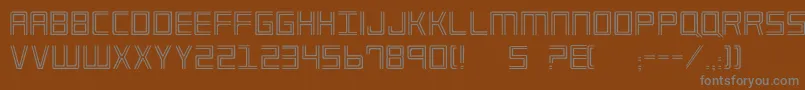 Imp2-fontti – harmaat kirjasimet ruskealla taustalla