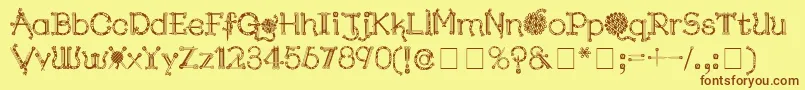 KingthingsNeedles Font – Brown Fonts on Yellow Background