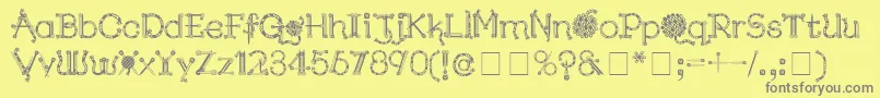 KingthingsNeedles Font – Gray Fonts on Yellow Background