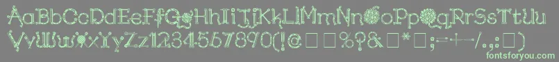 Czcionka KingthingsNeedles – zielone czcionki na szarym tle