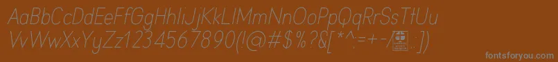 Шрифт AprikasLightItalicDemo – серые шрифты на коричневом фоне