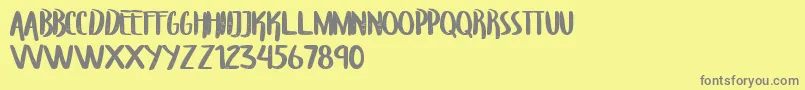 TroupersCapitals Font – Gray Fonts on Yellow Background