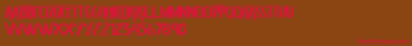 TroupersCapitals Font – Red Fonts on Brown Background