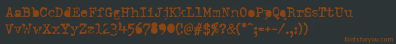 Шрифт DumboldtypewriterAlternatebold – коричневые шрифты на чёрном фоне