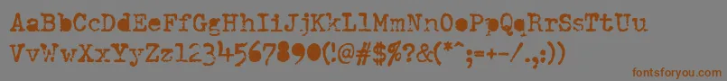 DumboldtypewriterAlternatebold Font – Brown Fonts on Gray Background