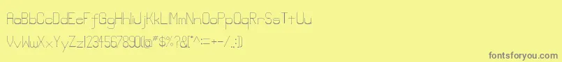 Lowerlay-Schriftart – Graue Schriften auf gelbem Hintergrund