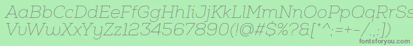 フォントNexaSlabThinItalic – 緑の背景に灰色の文字