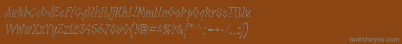フォントLinotypesunbursteastRegular – 茶色の背景に灰色の文字